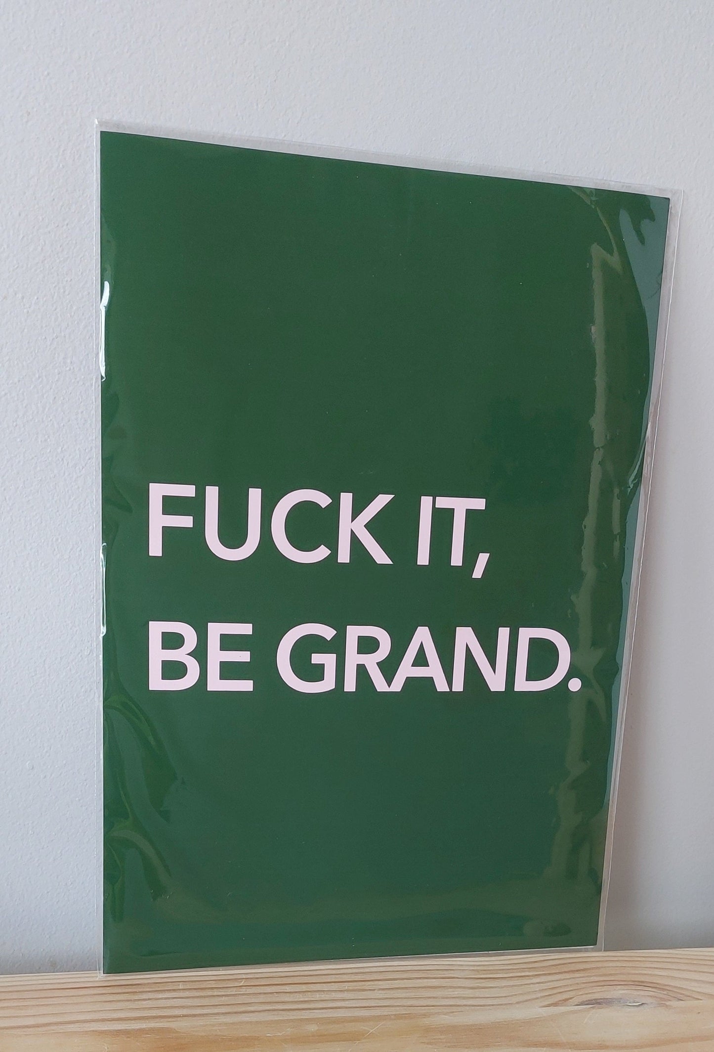 Not for the faint-hearted. This bright “Fuck It, Be Grand” print is pure Irish defiance in poster form – A4 size, unframed, designed in Tramore.